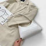 Cécile. - Błyszcząca skórzana torba